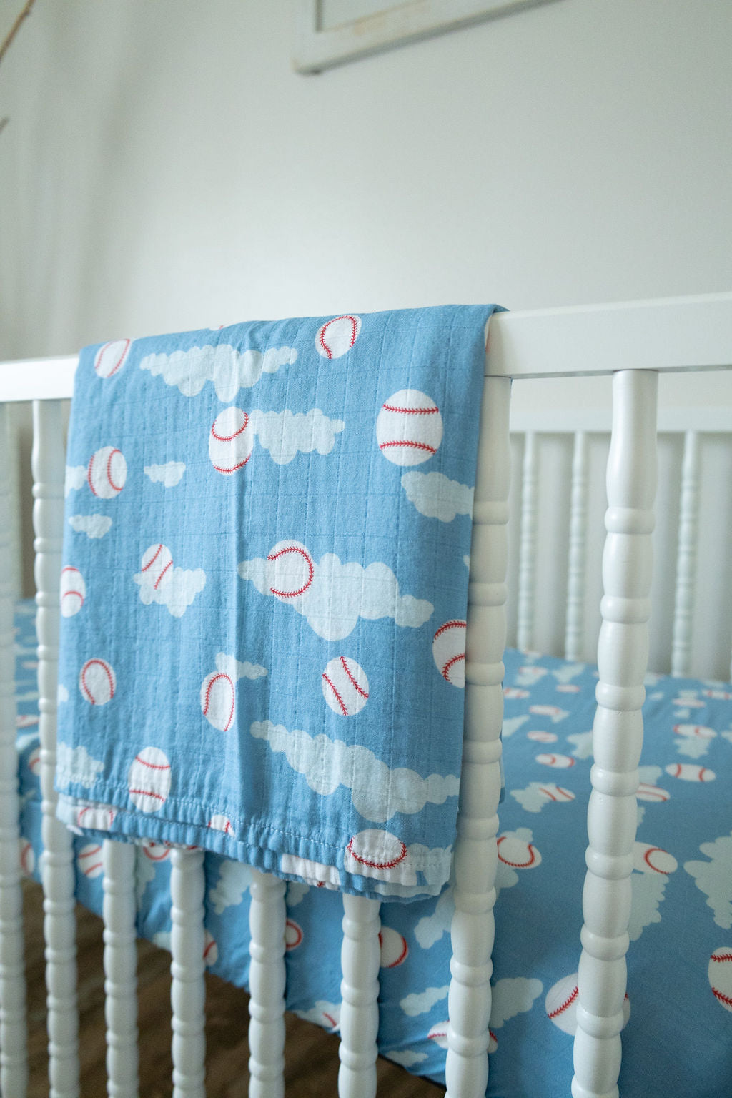 Organic Bamboo Cotton Muslin Crib Sheet in Baseballs in the Sky