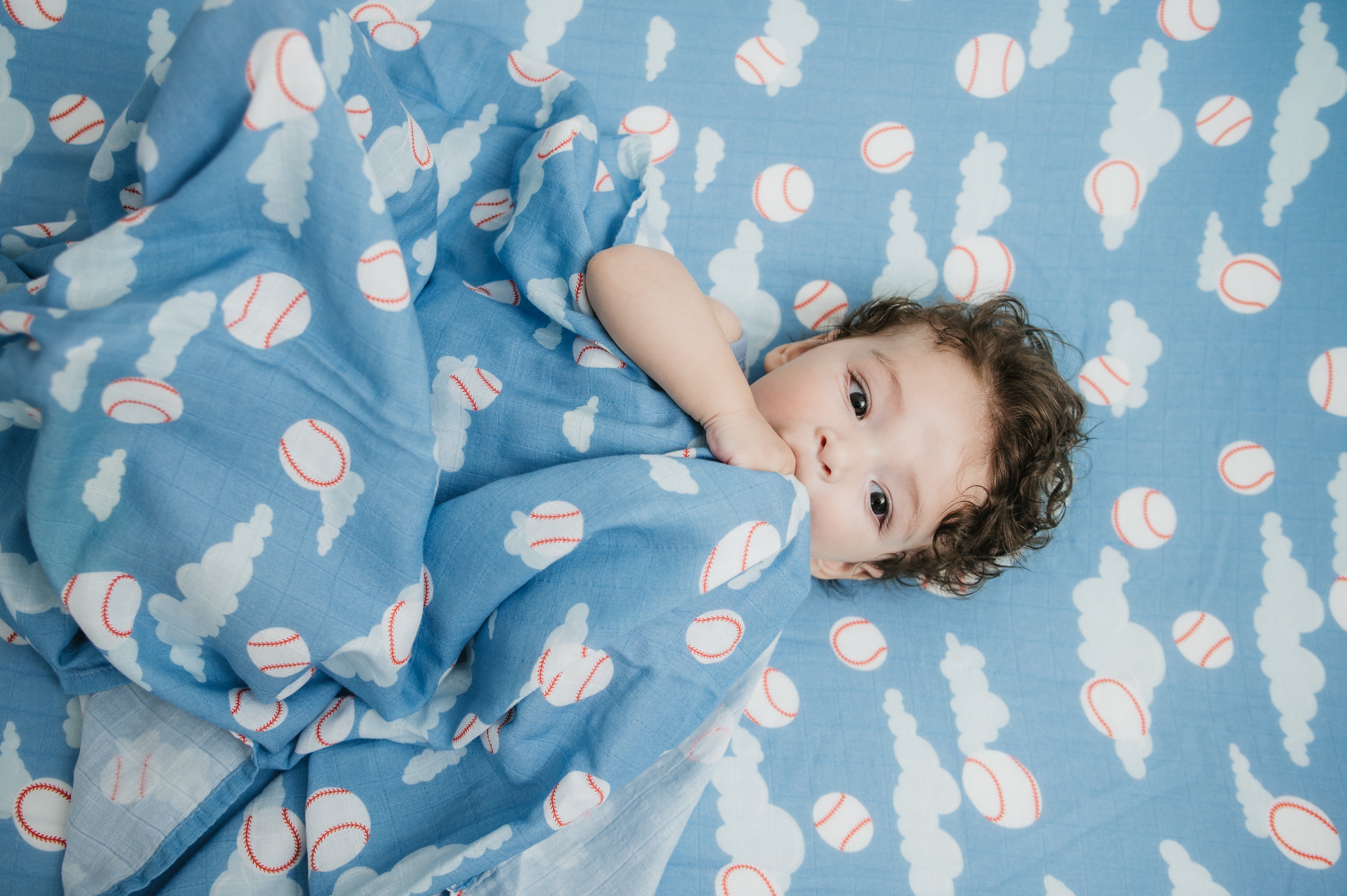 Organic Bamboo Cotton Muslin Swaddle Blanket in Baseballs in the Sky